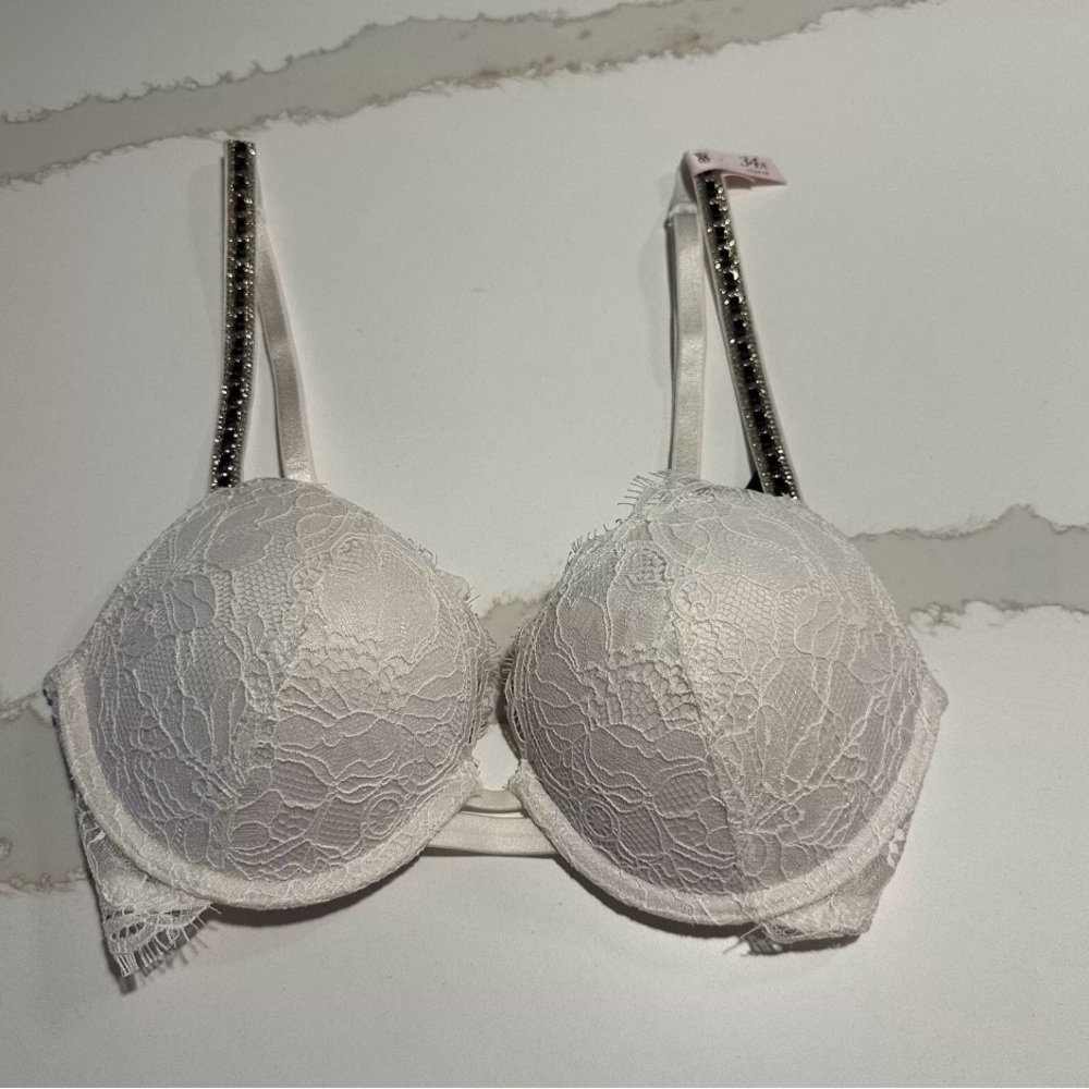 Victoria’s Secret White lace Push up bra with Blingy Straps.